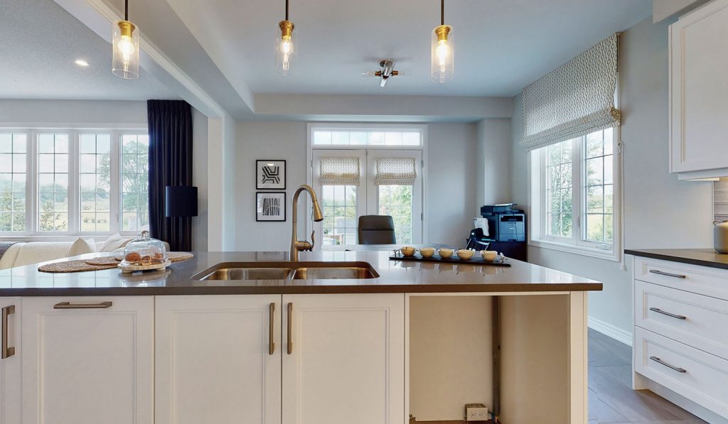 Picture Homes Model Home - Kitchen Light Fixtures Hanging Above Sink and Table