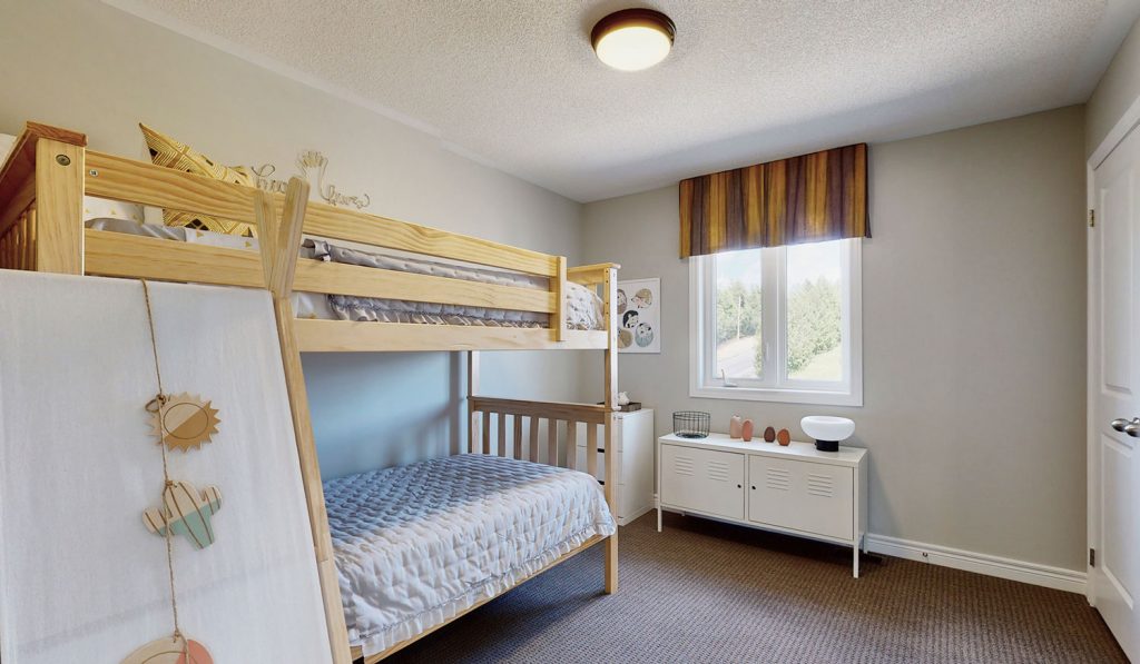 Picture Homes Model Home - Bunk Beds and Dresser in Childs Bedroom