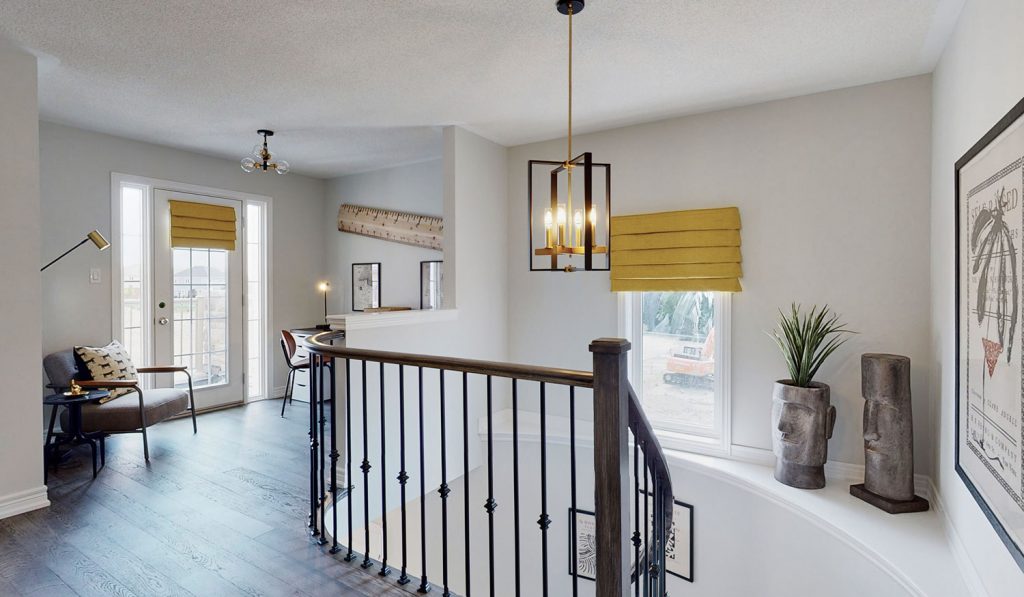 Picture Homes Model Home - Second Floor Top of Staircase with Desk and Office Chair