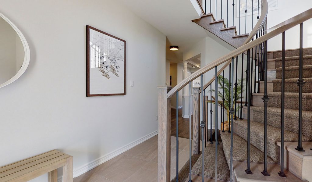 Picture Homes The Hampton Model Home - Front Entrance and Bottom of Staircase