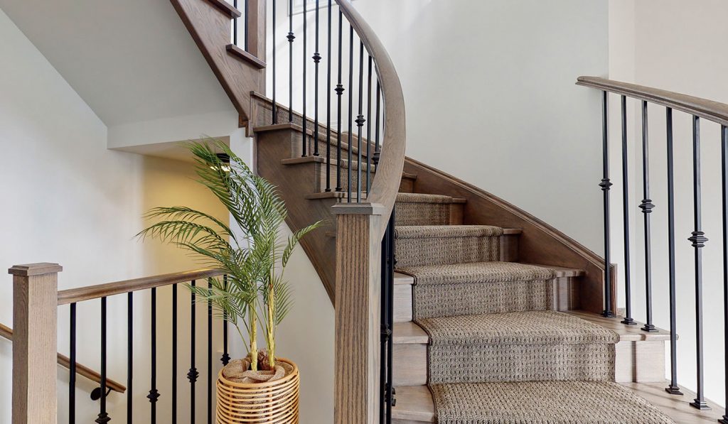 Picture Homes The Hampton Model Home - Hardwood and Carpet Staircase Leading to Second Floor