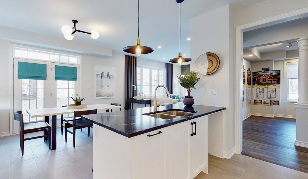 Picture Homes The Hampton Model Home - Kitchen Island with Granite Countertop