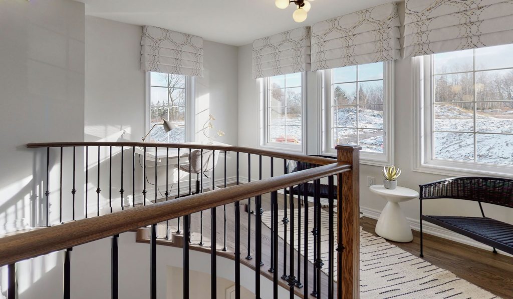 Picture Homes The Hampton Model Home - Staircase and Upstairs Hallway Windows Looking Outside