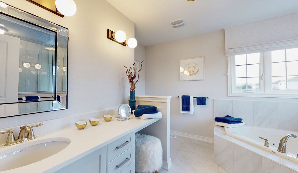 Picture Homes The Hampton Model Home - Ensuite Bathroom with Tiled Floors and Natural Light