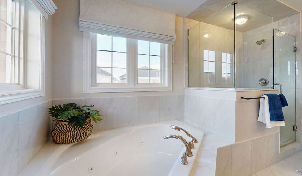 Picture Homes The Hampton Model Home - Ensuite Bathroom with Large Bathtub and Walk in Shower